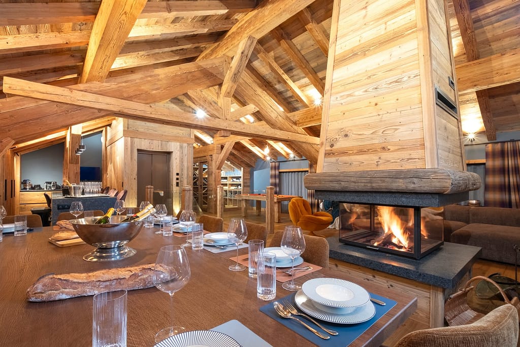 Powder Pines Luxury Travel - Chalet Ruisseau Fireplace Dining