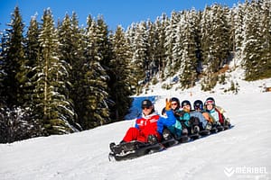 Powder Pines Luxury Travel - Méribel Sledging - Photo Credit Sylvain Aymoz